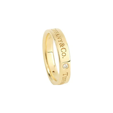 TIFFANY & CO. Серия Tiffany & Co.® ® Серия Гравировка букв Кольцо из 18-каратного золота Кольцо из 18-каратного золота для пар мужчин и женщин