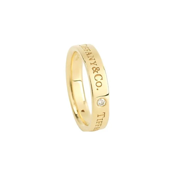 TIFFANY &amp; CO. Серия Tiffany &amp; Co.® ® Серия Гравировка букв Кольцо из 18-каратного золота Кольцо из 18-каратного золота для пар мужчин и женщин